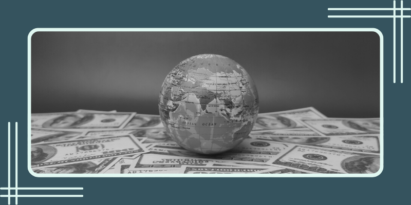 A globe on a pile of cash from international betting tax takings